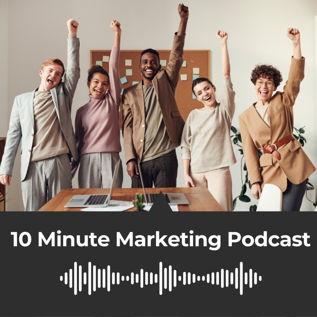 10 Minute Marketing Podcast title card for Turning Your Company Culture Into Content Marketing: image of a company's marketing team dressed in business-casual attire all raising their fists triumphantly and smiling.